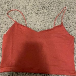 reddish/pink tank size M